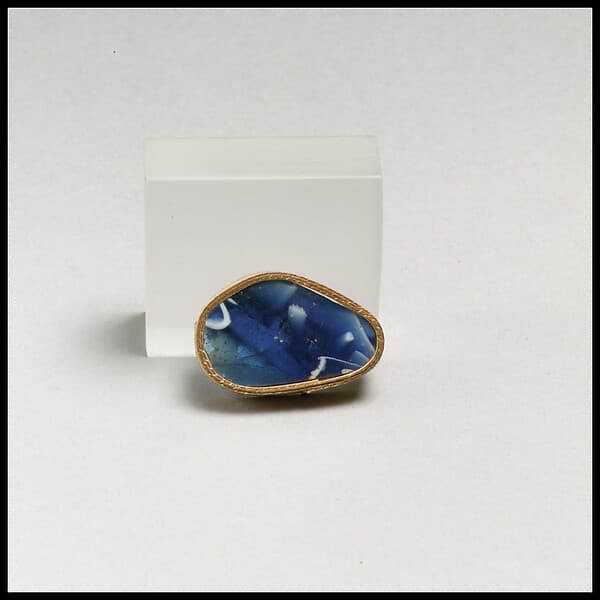 Glass mosaic ribbed bowl fragment
