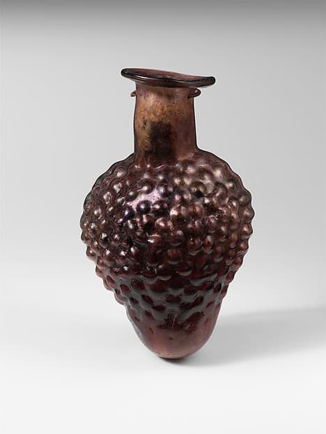 Glass bottle shaped like a bunch of grapes