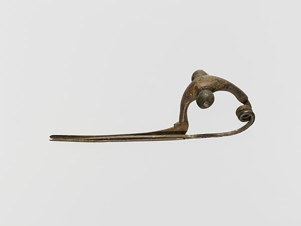 Bronze bow-type fibula (safety pin)