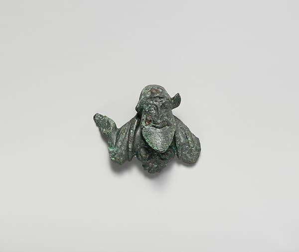 Bronze attachment with satyr head