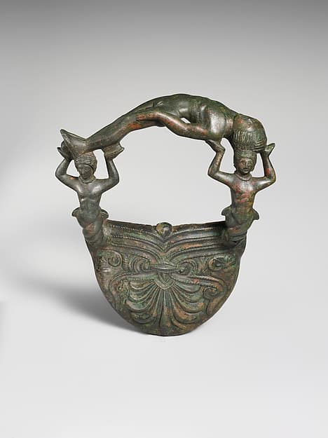 Bronze handle with nereids supporting a youth
