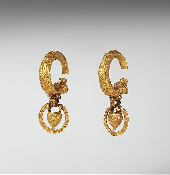 Gold earrings with pendant vase and ring