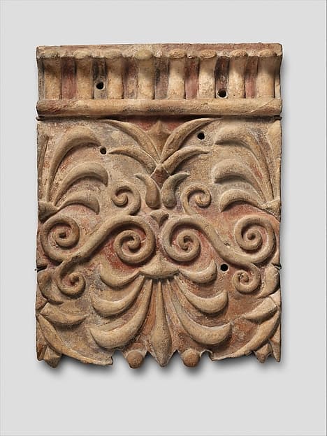 Terracotta architectural plaque with lotus and palmette designs