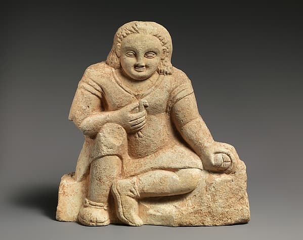 Limestone statuette of a temple girl