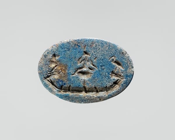 Lapis lazuli intaglio: Harpocrates in a papyrus boat