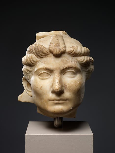 Two marble portrait heads from a relief
