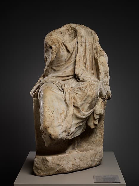 Marble statue of a draped seated man, by Zeuxis
