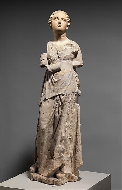Marble and limestone statue of an attendant