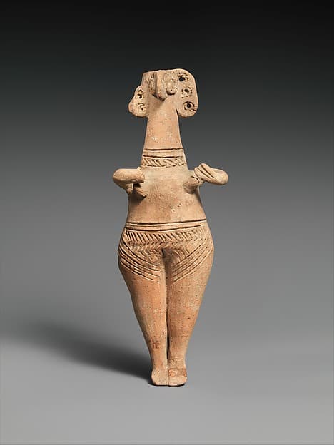 Terracotta statuette of woman with bird face