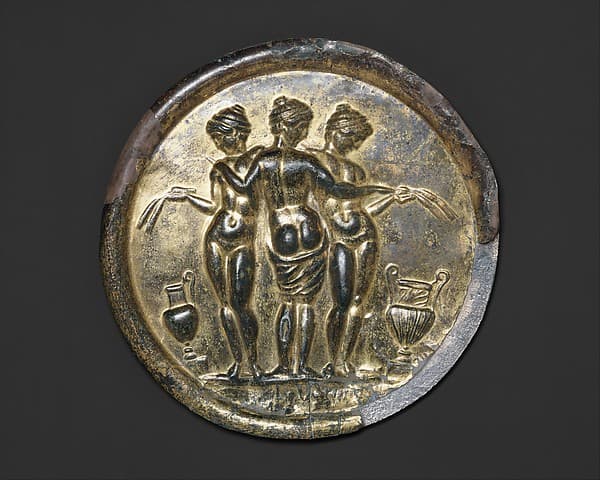 Gilded bronze mirror with the Three Graces