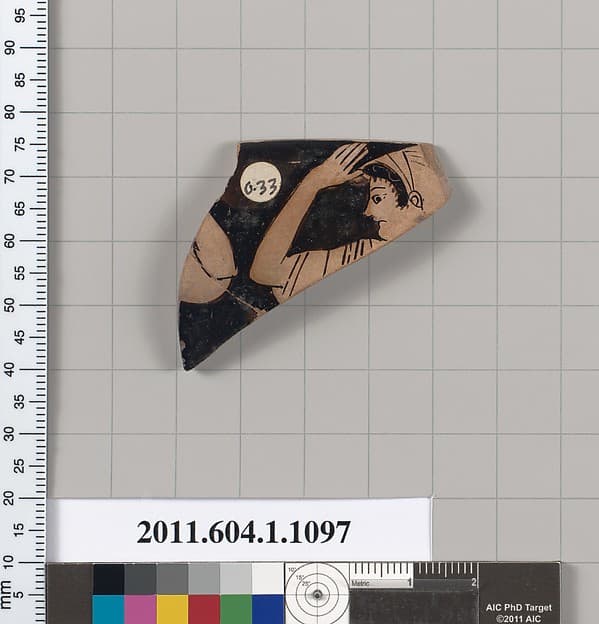 Terracotta rim fragment of a kylix (drinking cup), by Nikosthenes Painter