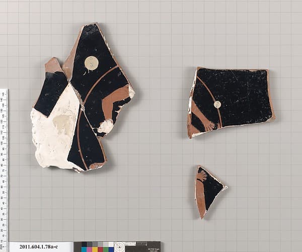 Terracotta fragments of a kylix (drinking cup), by Kachrylion