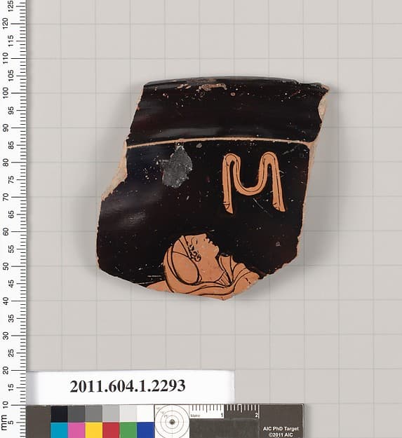 Terracotta rim fragment of a kylix (drinking cup)