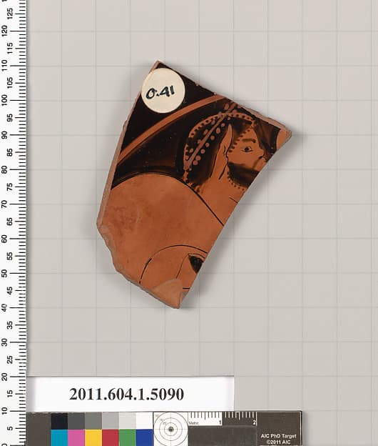 Terracotta fragment of a kylix (drinking cup), by Nikosthenes Painter