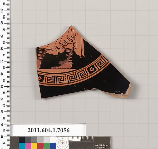 Terracotta fragment of a kylix (drinking cup)