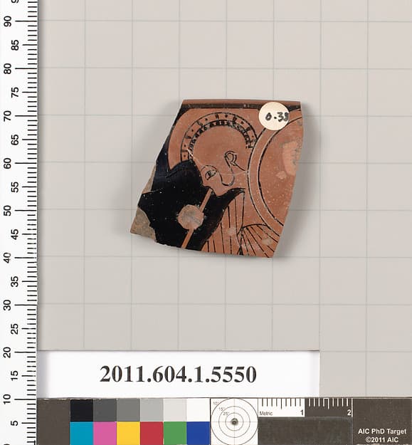 Terracotta rim fragment of a kylix (drinking cup), by Nikosthenes Painter