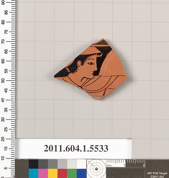 Terracotta fragment of a kylix (drinking cup), by Nikosthenes Painter