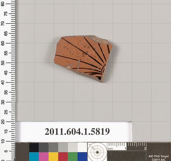 Terracotta fragment of a kylix: eye-cup (drinking cup)