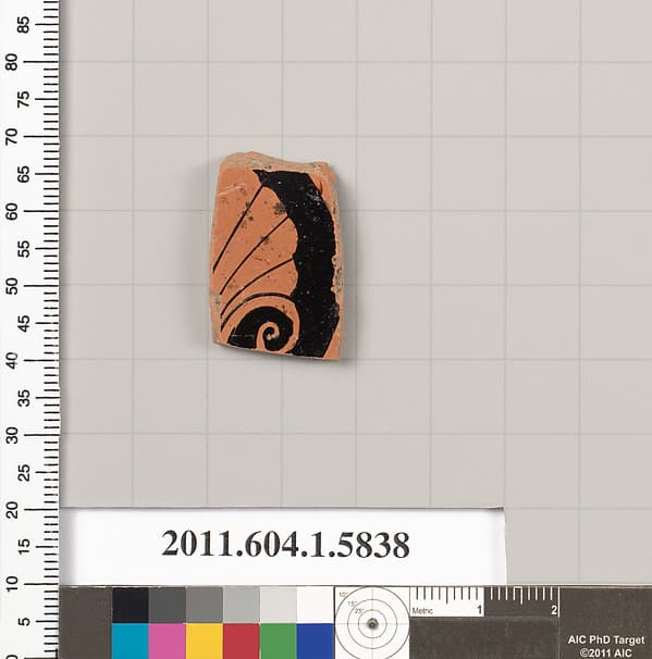 Terracotta fragment of a kylix: eye-cup (drinking cup)