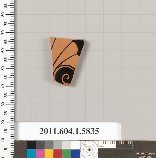 Terracotta fragment of a kylix: eye-cup (drinking cup)