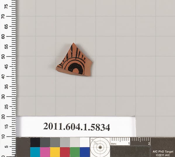 Terracotta fragment of a kylix: eye-cup (drinking cup)
