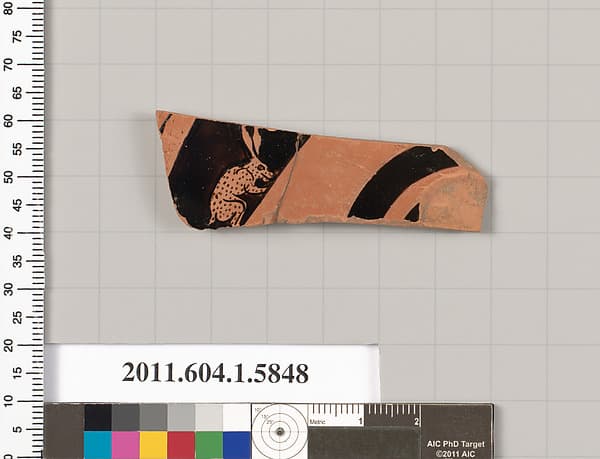 Terracotta fragment of a kylix: eye-cup (drinking cup)