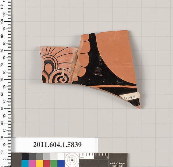 Terracotta fragment of a kylix: eye-cup (drinking cup)