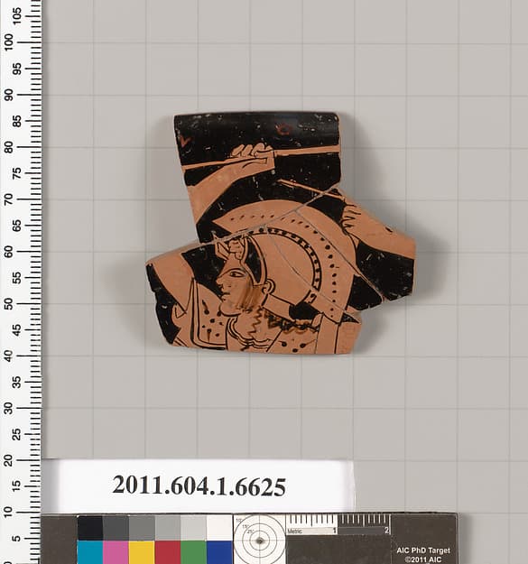 Terracotta rim fragment of a kylix (drinking cup)