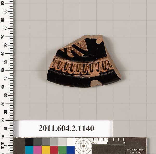 Terracotta fragment from a pyxis lid (box)