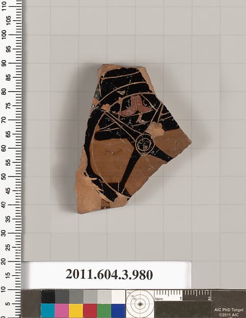 Terracotta fragment of a lekanis lid (covered dish)