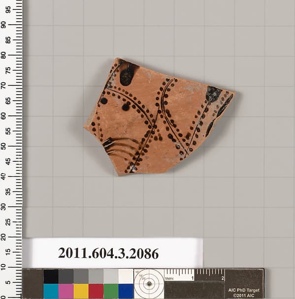 Terracotta fragment of a kylix (drinking cup)