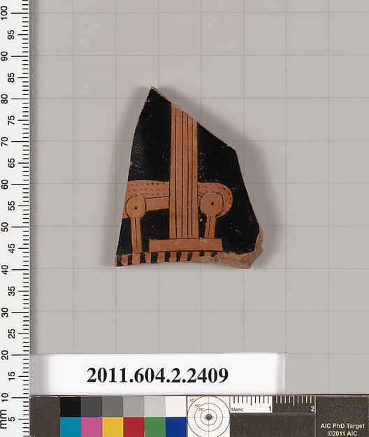 Terracotta fragment of a rhyton (vase for libations or drinking)