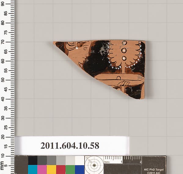 Terracotta fragment of a kylix (drinking cup)