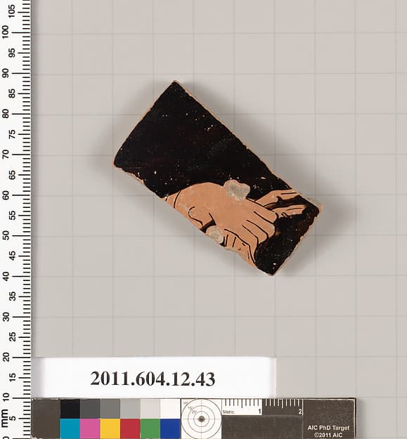 Terracotta fragment of a closed shape