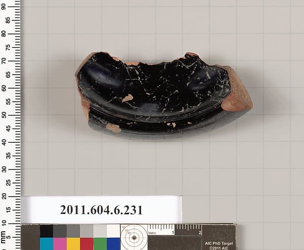 Terracotta fragment of a salt cellar?