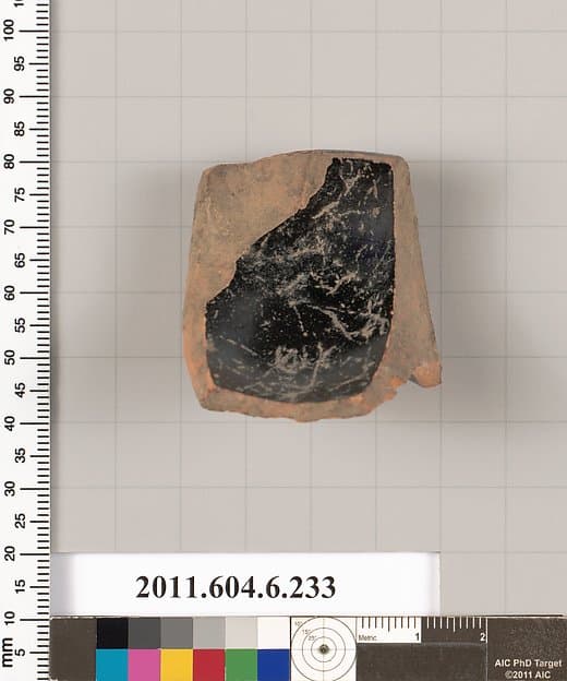 Terracotta fragment of a salt cellar?