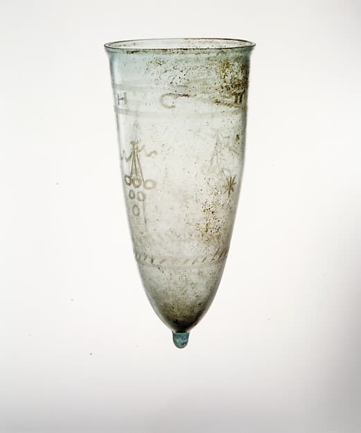 Glass beaker with cut decoration