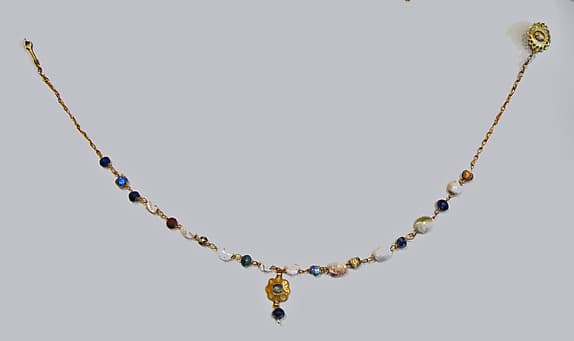 Gold, pearl, and glass necklace