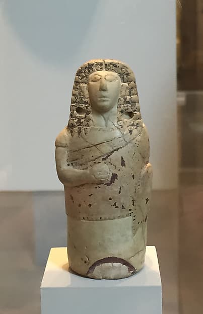 Terracotta aryballos (perfume vase) in the form of a human figure