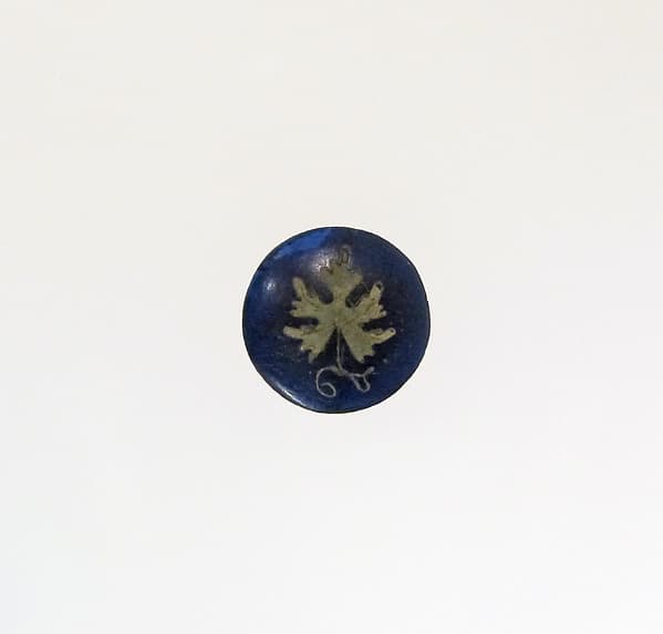 Glass and gold inlay