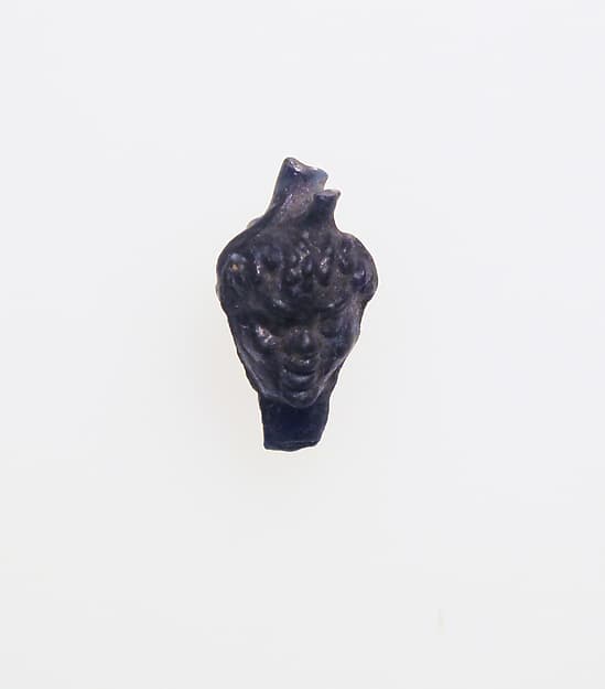 Glass pendant in the shape of a Black African’s head