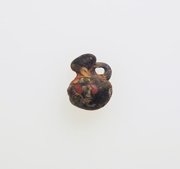Glass pendant shaped like a jug
