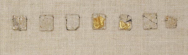 Glass ornaments with gold leaf overlay