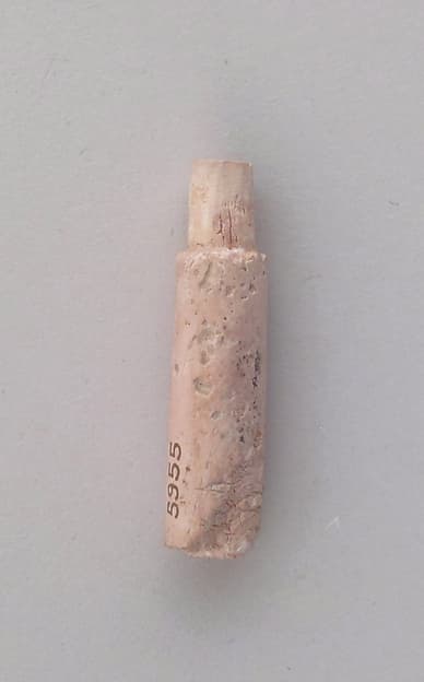 Peg, part of a spindle staff