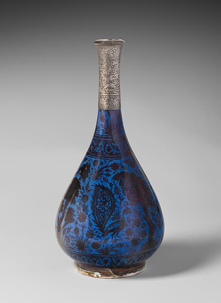 Bottle Depicting a Peacock in Foliage
