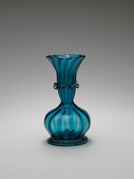 Turquoise Glass Bottle with an Onion Shaped Body