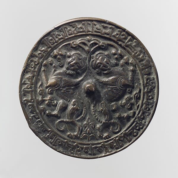 Mirror with a Pair of Addorsed Sphinxes with Scorpion Tails