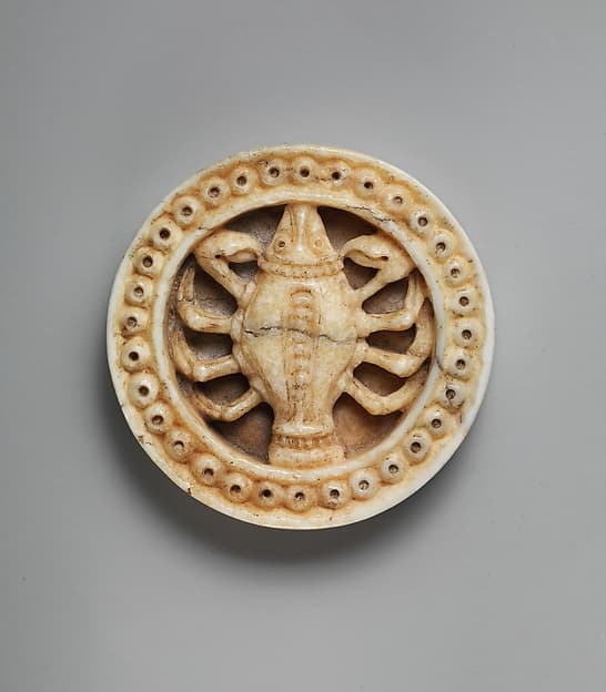 Game Piece with Zodiac Sign of Cancer or Scorpio