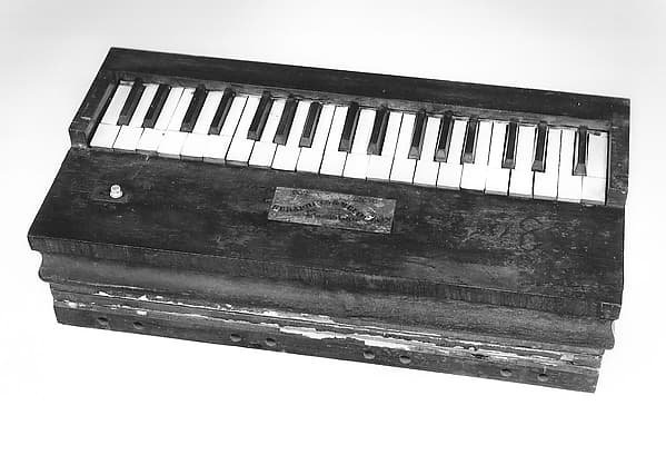 Rocking Melodeon, by Caleb Packard