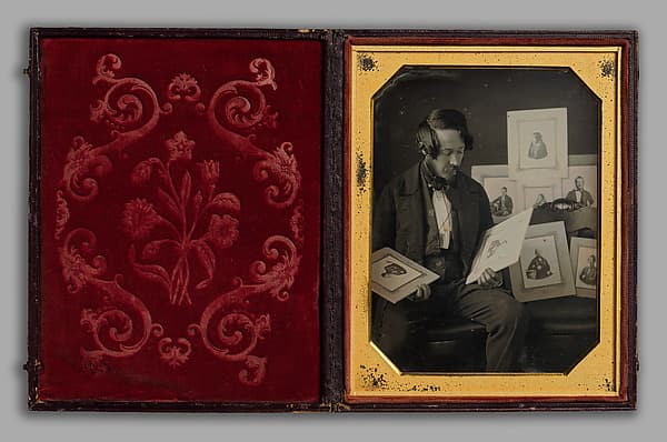 Frederick Langenheim Looking at Talbotypes, by W. & F. Langenheim
